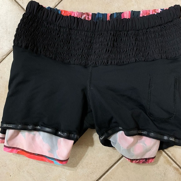 Lululemon floral shorts with built in tight black shorts. Ladies size 4. EUC - Picture 12 of 13